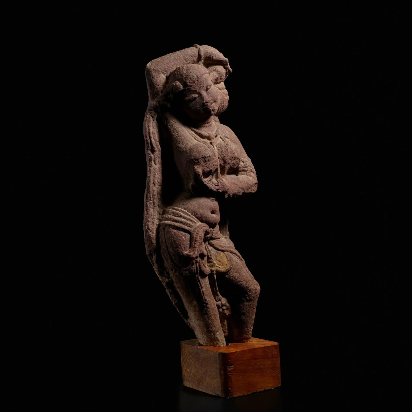 A RED SANDSTONE FIGURE OF A CELESTIAL BEAUTY (SURASUNDARI)
