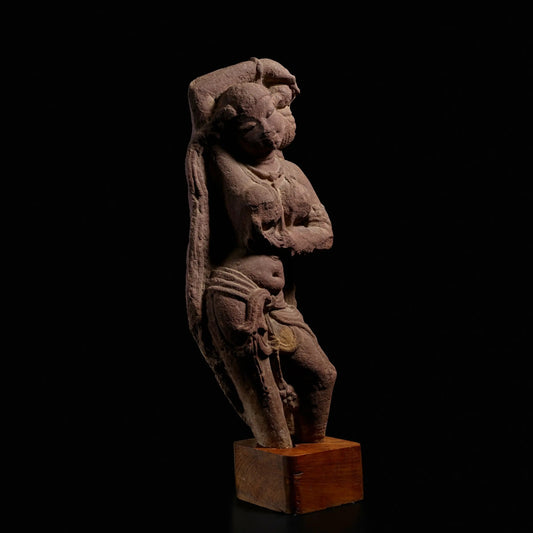 A RED SANDSTONE FIGURE OF A CELESTIAL BEAUTY (SURASUNDARI)